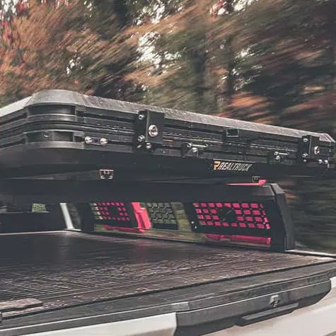 GoTent on back of truck closed up in forest