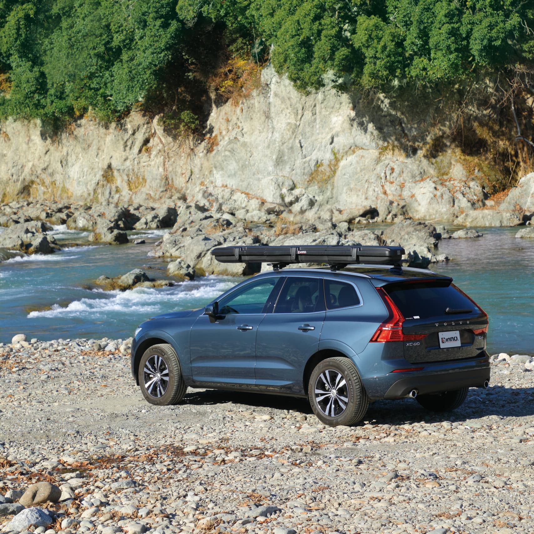 Inno Adjustable Fishing Road Carrier on vehicle at river