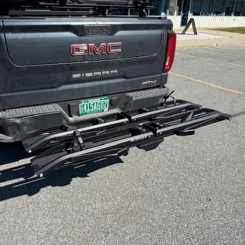 Kuat Piston ION installed on back of GMC Sierra ATV folded down