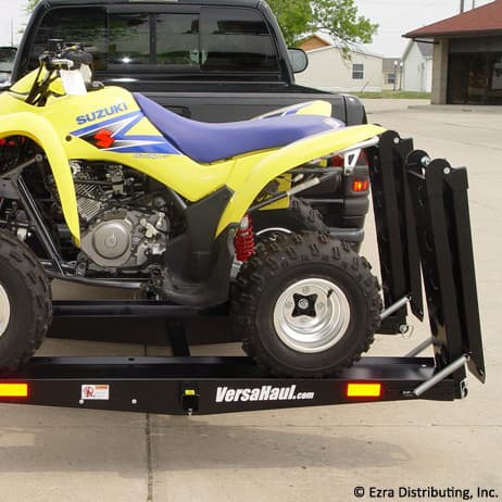 VersaHaul Lawn and Garden Carrier with ramp loaded with atv