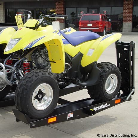 VersaHaul Lawn and Garden Carrier with ramp loaded with atv side view