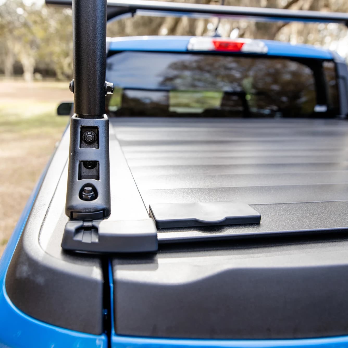 RetraxPro XR Tonnea Cover - Elevate Truck Rack Close Up Rail Lock