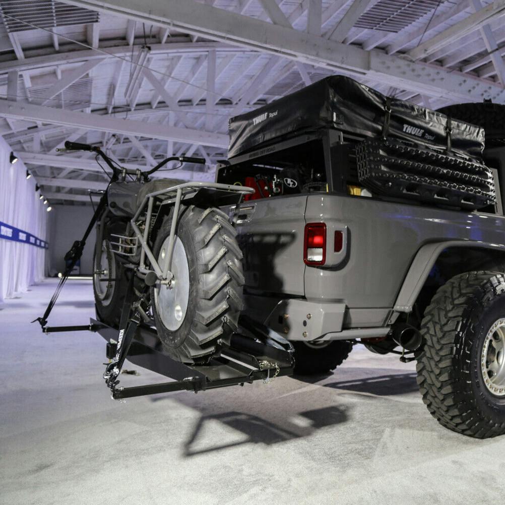 VersaHaul Sport Carrier with ramp on decked out Jeep Gladiator in Showroom