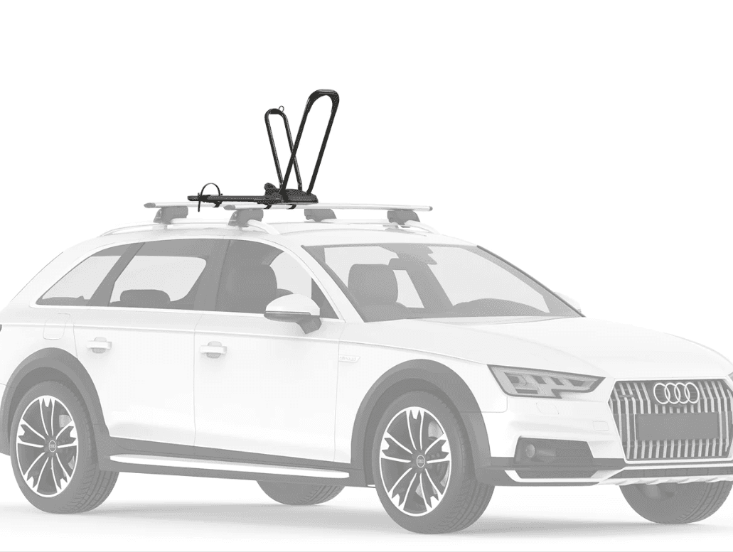 Bike rack installed on white car