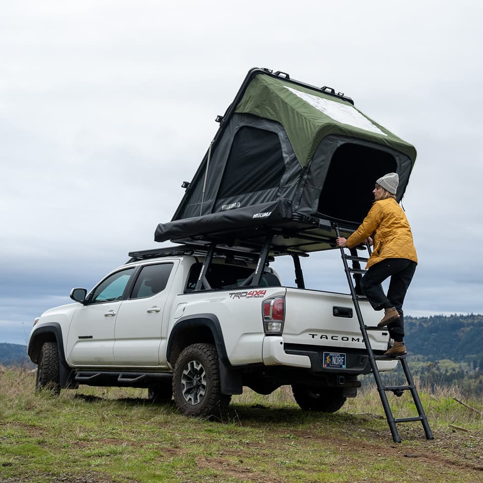 lifestyle pic in nature of SkyPeak HD tent on back of truck