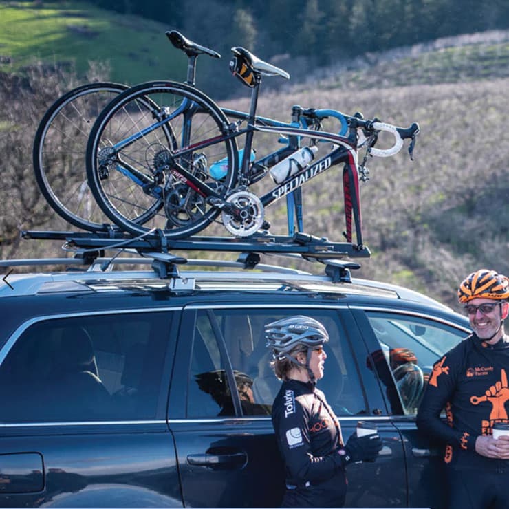 Yakima HighSpeed Bike rack on roof of vehicle loaded with a bike in nature