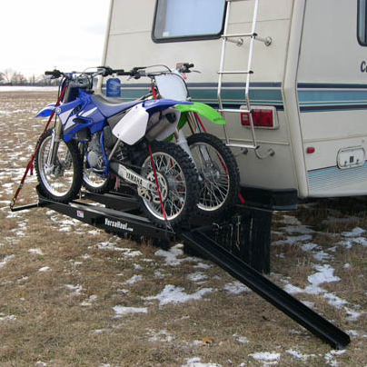 VersaHaul Double Motorcycle Carrer with ramp loaded up on back of RV with ramp out