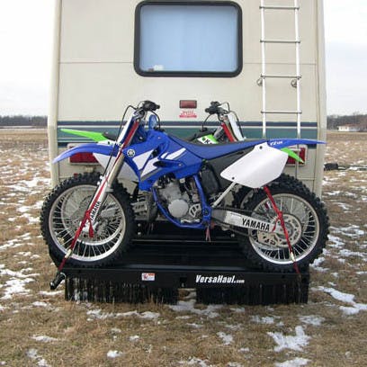 VersaHaul Double Motorcycle Carrier loaded with two motorcycles on back of RV