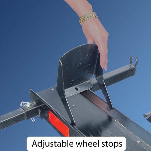 VersaHaul close up picture of adjustable wheel stops on single motorcycle carrier