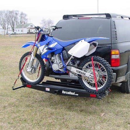 VersaHaul Single Motorcycle Carrier with ramp on back of SUV