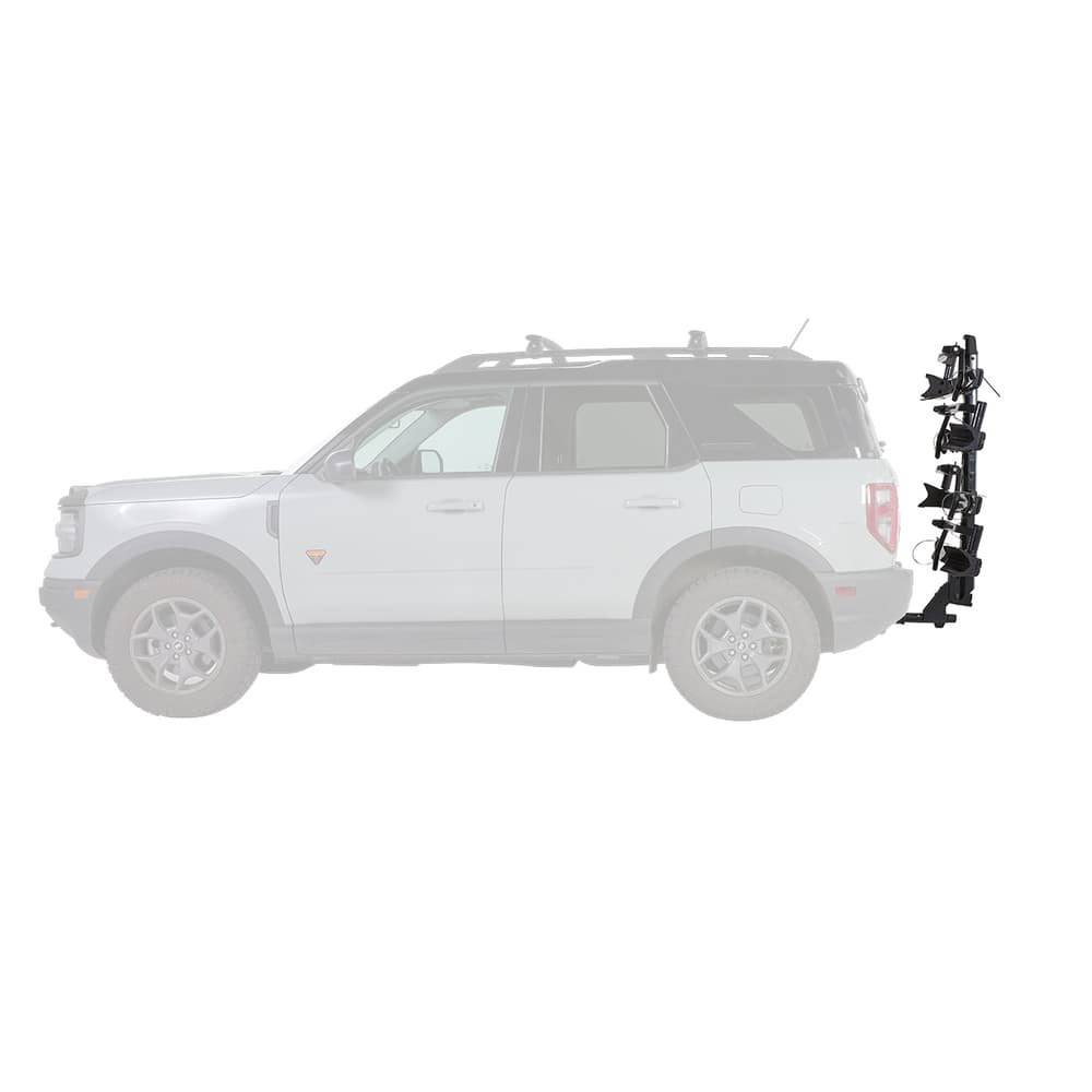 StageTwo add-on attached to the StageTwo installed on back of SUV - side profile with bikes loaded