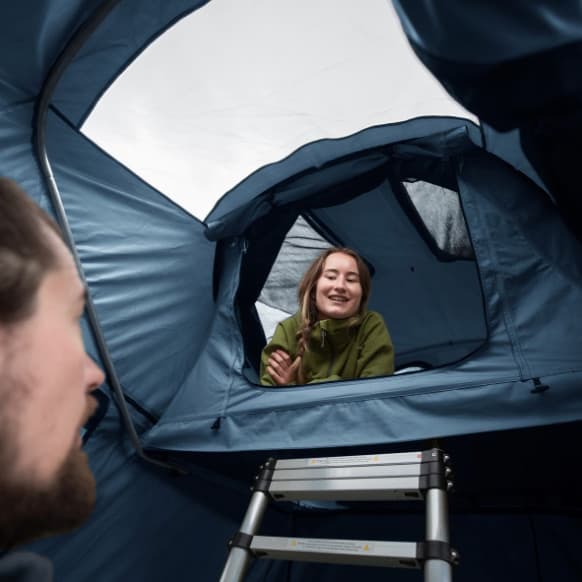 Person inside of Approach tent to show the inside of Annex
