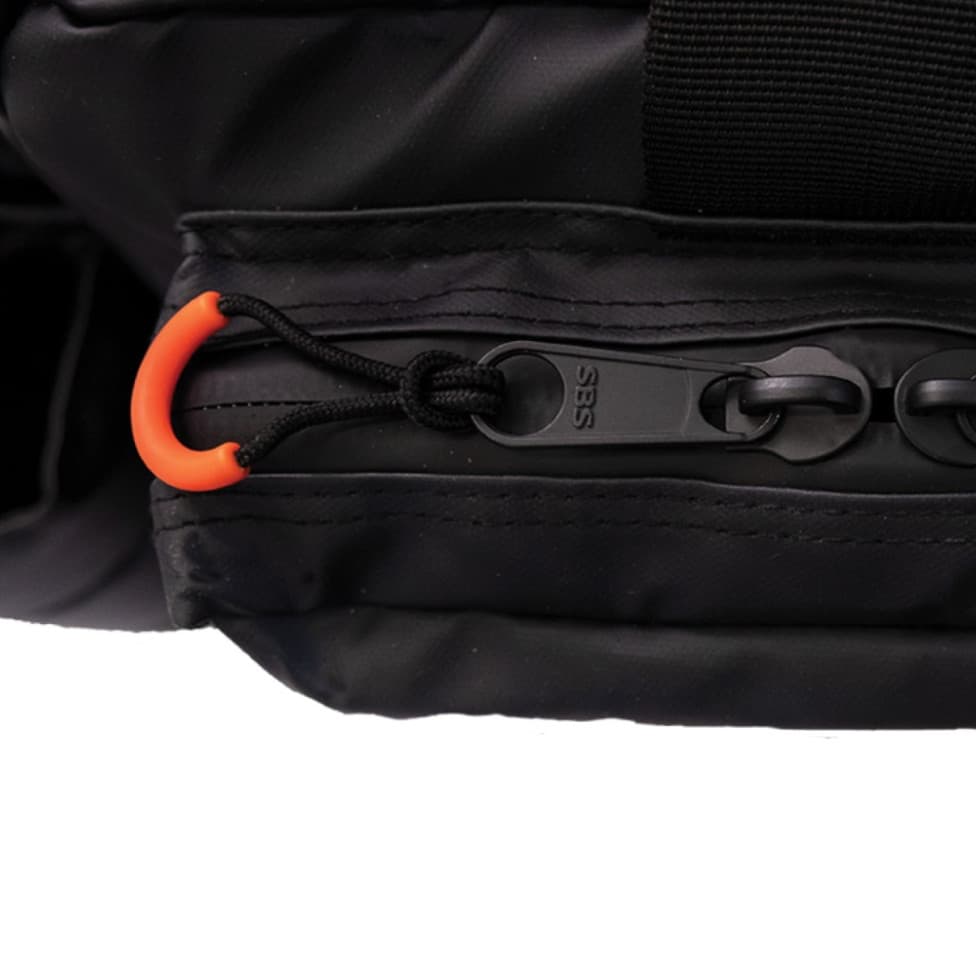 close-up of zipper and hooks on maxtrax recovery kit bag on white background