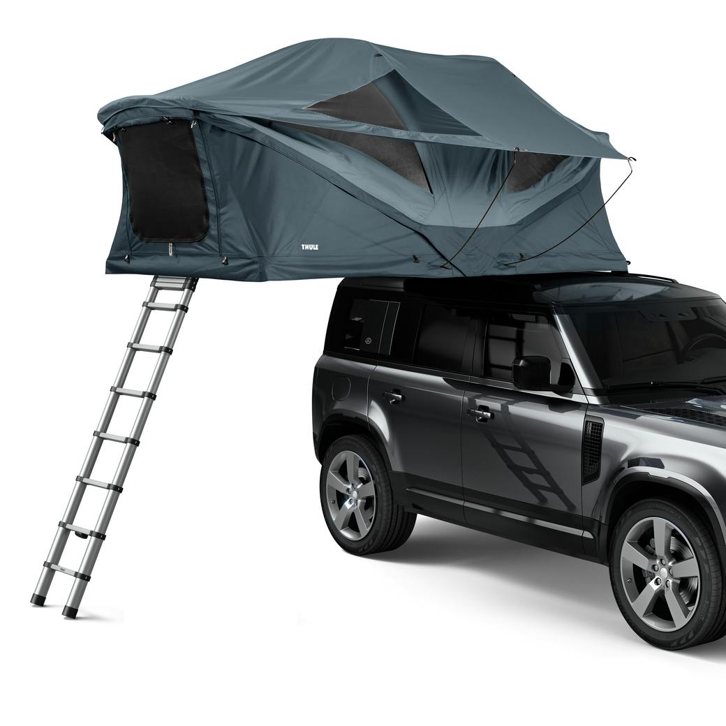 Dark Slate Medium Thule Approach Rooftop Tent on top of vehicle angled view