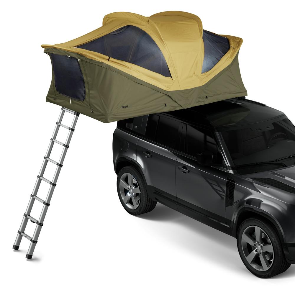 Fennel Tan Small Thule Approach Rooftop Tent on top of vehicle angled view