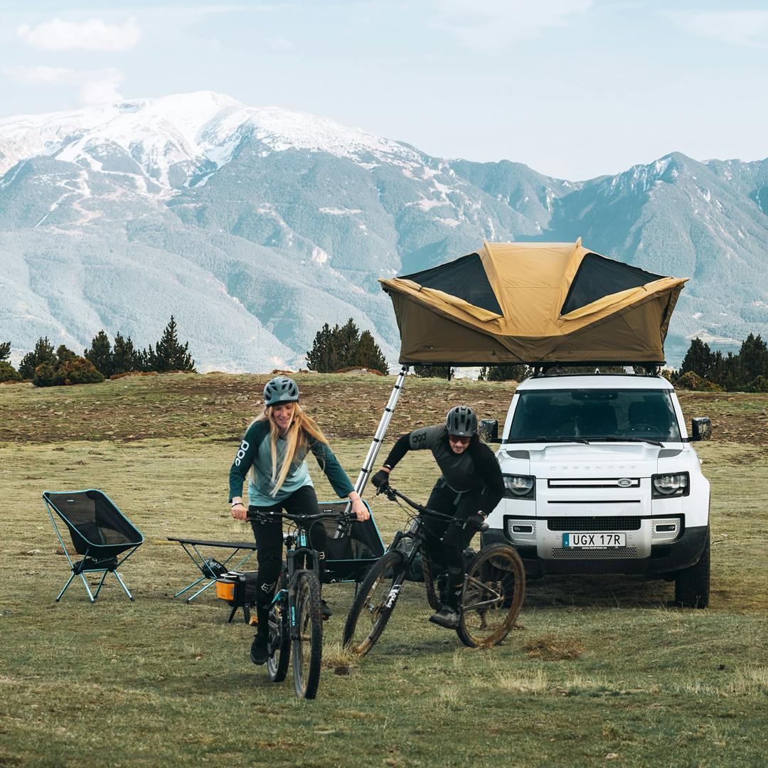 Thule Approach Rooftop Tent set-up at campsite with mountain in the background