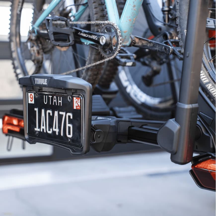 Close up of a license plate on theThule Verse Light and License plate kit installed on bike rack