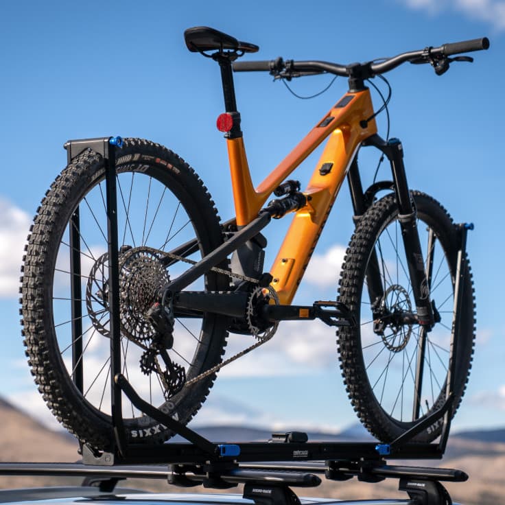 RockyMounts MachTen loaded with a bike on it in nature