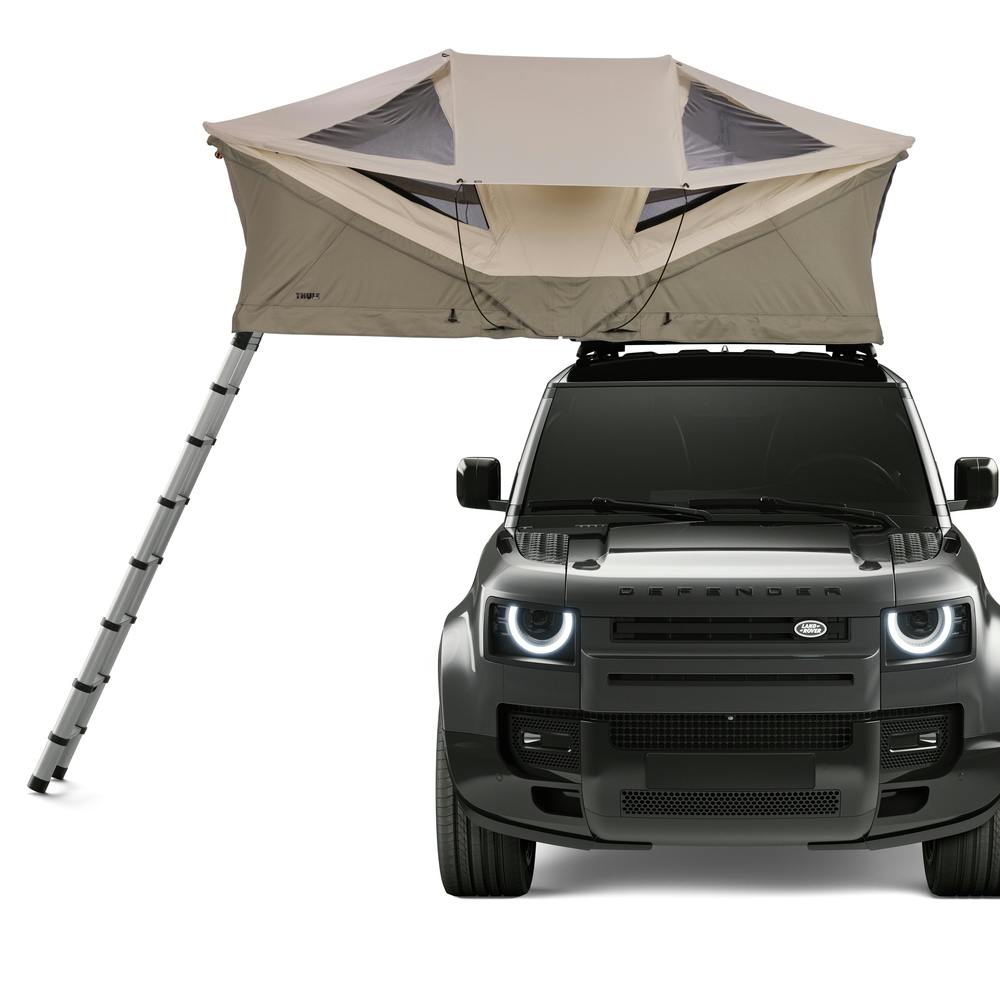 Pelican Gray Small Thule Approach Rooftop Tent on top of vehicle front view