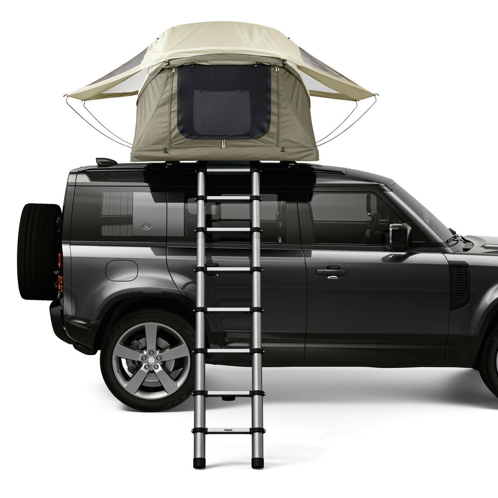 Pelican Gray Small Thule Approach Rooftop Tent on top of side view of tent