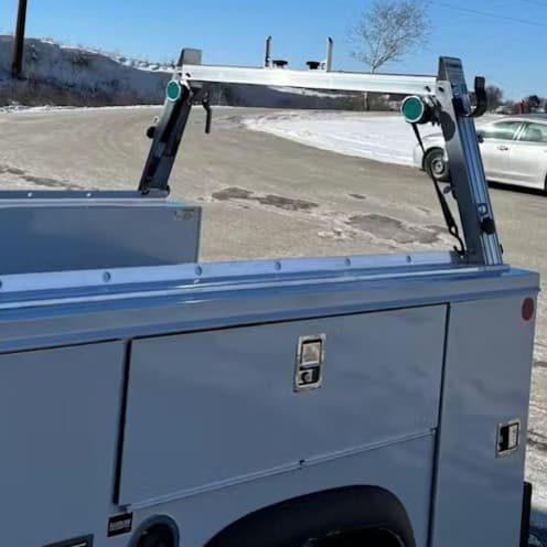Close-up of base rail and back crossmember on System One service body utility ladder rack