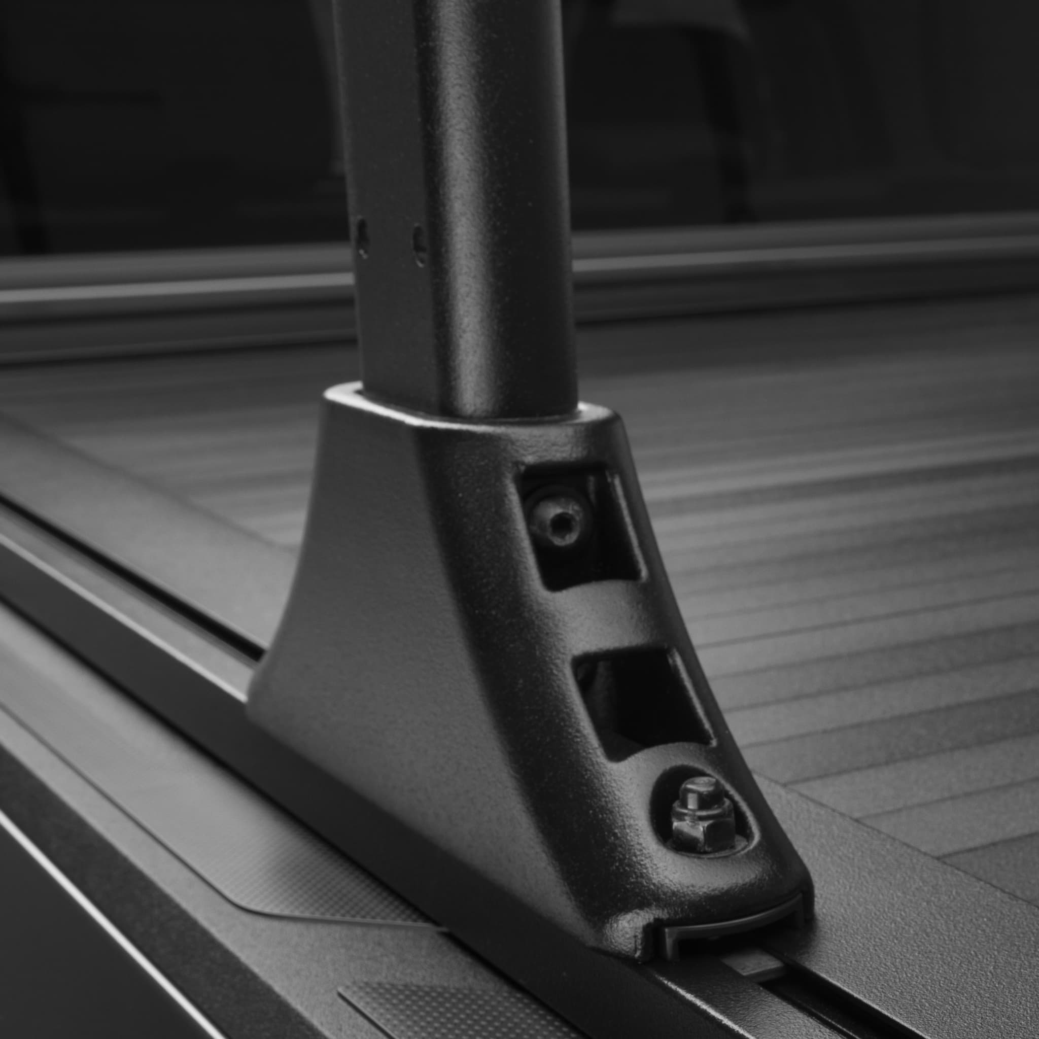 RetraxOne XR Tonneau Cover and TruXedo Elevate Truck Rack upright close up of base