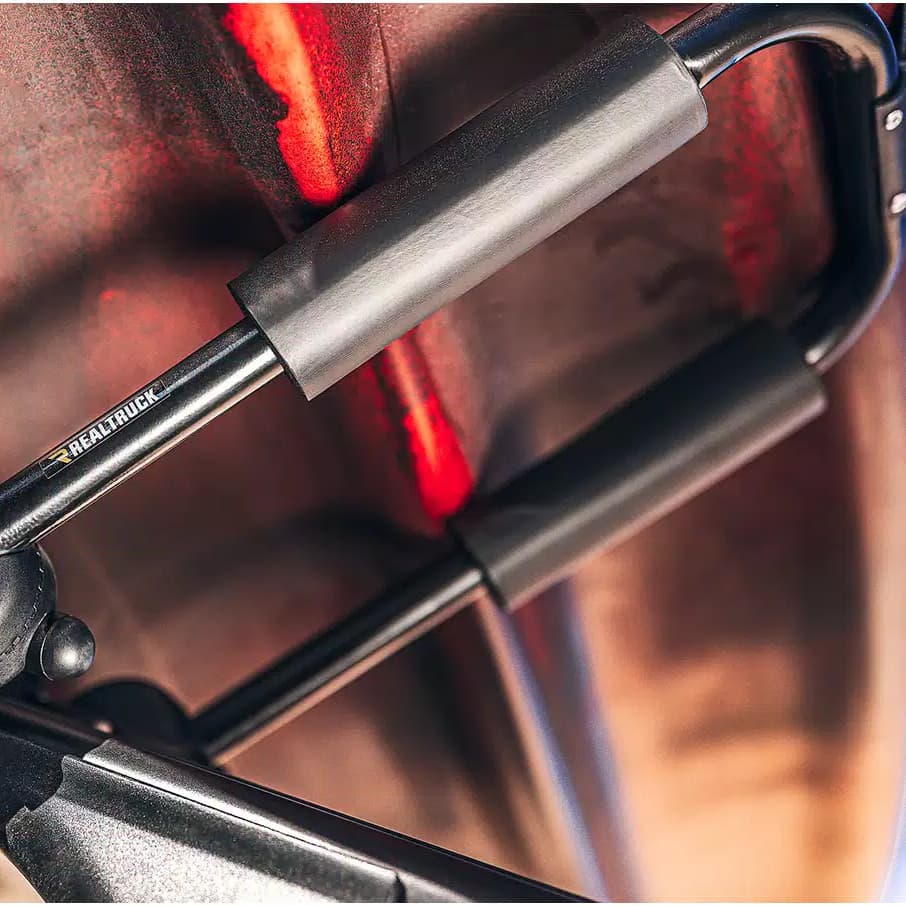 Lifestyle photo close-up of J-cradle on the Elevate Kayak rack