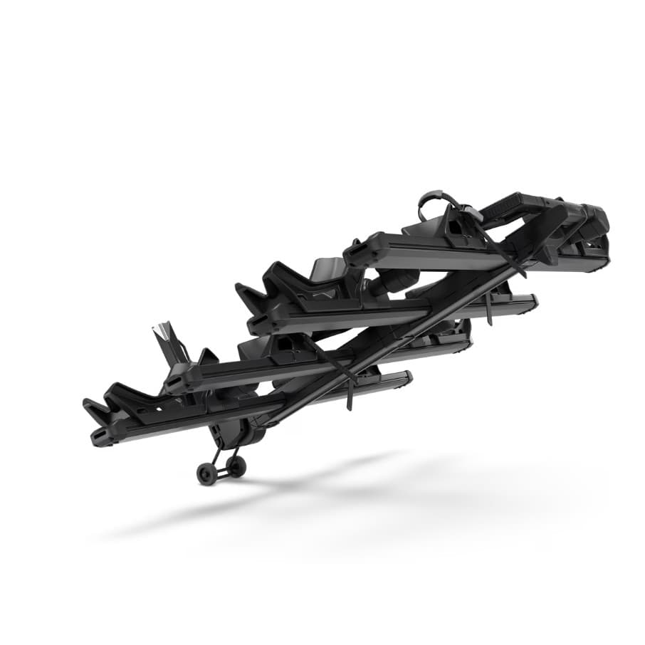 Thule Transport Wheels attached to a 4 bike Thule Rack on white background